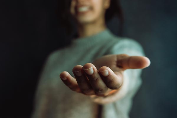 Clinical professional reaching out