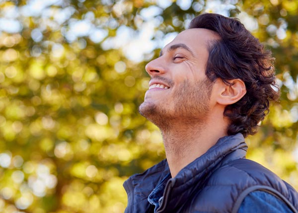Man enjoying time outdoors for his mental health