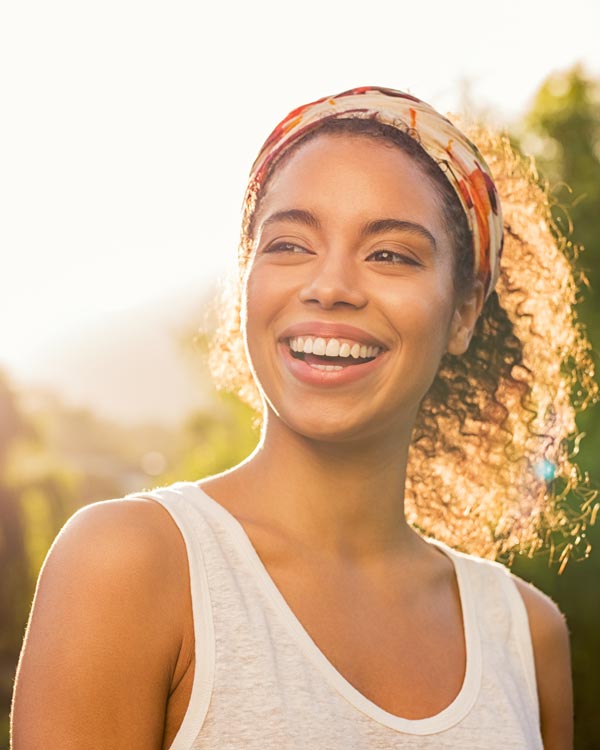 Woman enjoying time outdoors for her mental health